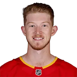 headshot of Dustin