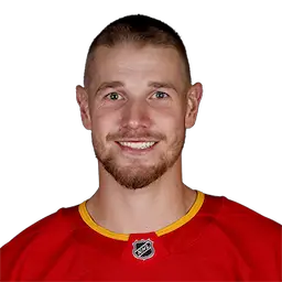 headshot of Adam