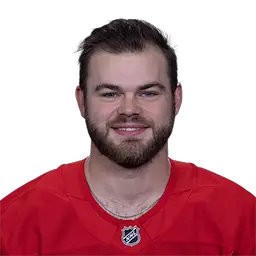 headshot of Alex