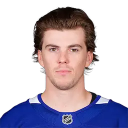 headshot of Topi