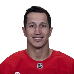 headshot of Dominik