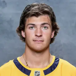 headshot of Brady