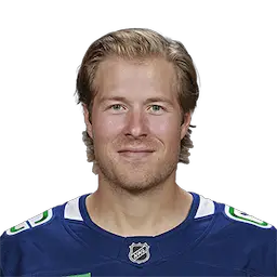 headshot of Brock