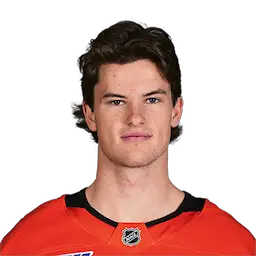 headshot of Thomas